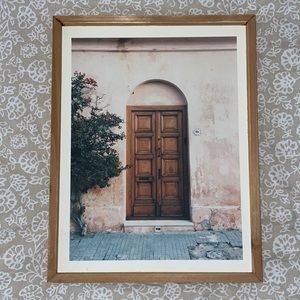Framed wooden painting of rustic door